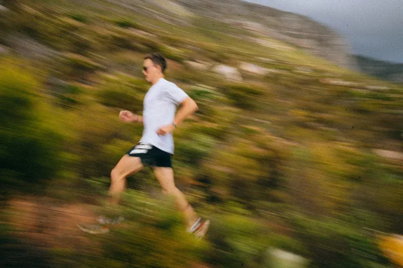 hiking trail with man running